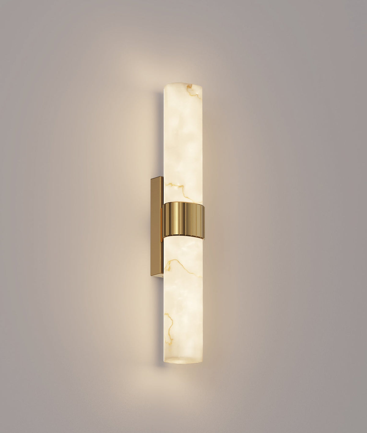CLA FLECHA1M medium curved faux marble wall light – illuminated view