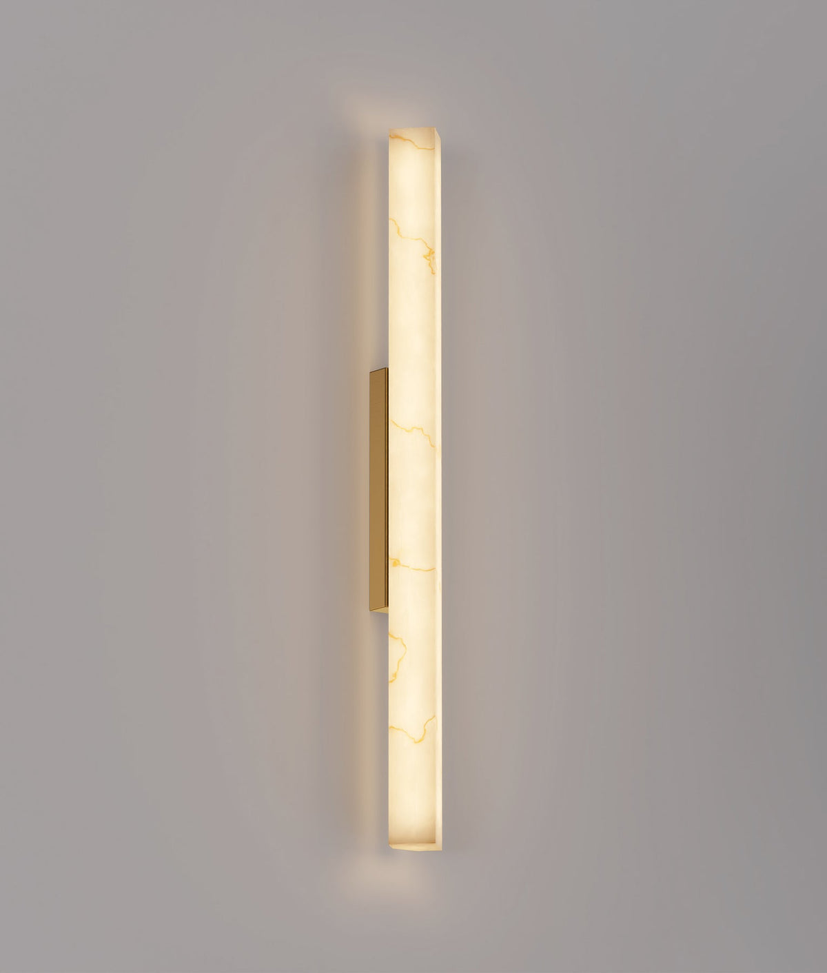 CLA FLECHA2L large angled faux marble wall light – illuminated view