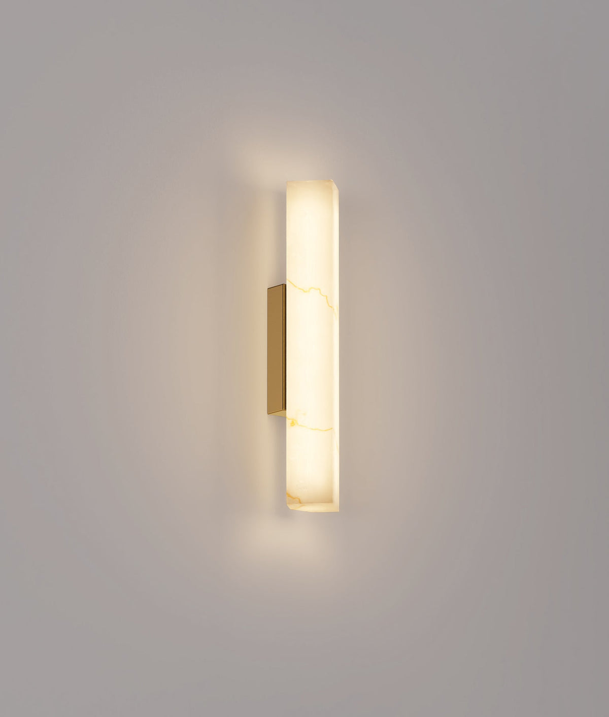 CLA FLECHA2S small angled faux marble wall light – illuminated view